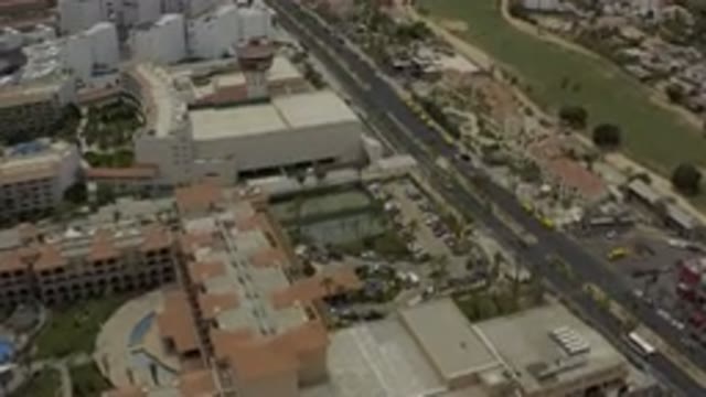 LOS CABOS MEXICO-2019: Drone Footage Flying Over Hotel Resorts And Quiet Main Roads
