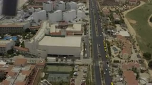 LOS CABOS MEXICO-2019: Drone Footage Of City Buildings Roads Traffic Trees Pools
