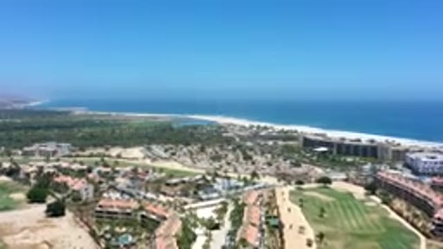 LOS CABOS MEXICO-2019: Aerial Footage Of A Large City Near A Large Body Of Water