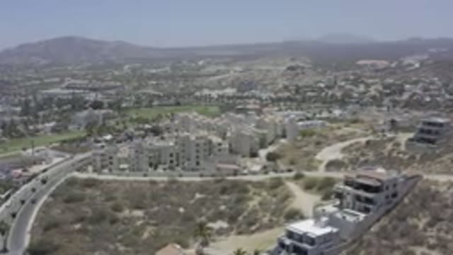 LOS CABOS MEXICO-2019: Drone Footage Over City Buildings Traffic Cars Roads