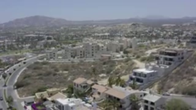 LOS CABOS MEXICO-2019: Panning Aerial Shot Of Sunny Exotic Scenery With