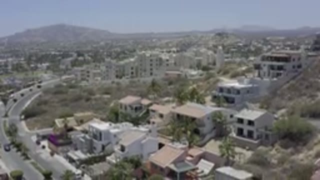 LOS CABOS MEXICO-2019: Different Size Buildings Are Spread Across a Grassy Neighborhood