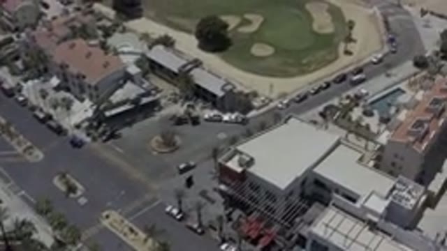 LOS CABOS MEXICO-2019: Drone Footage Over Town Streets Traffic Cars Parking Lots
