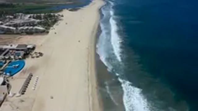 LOS CABOS MEXICO-2019: Take Flight Over The Crashing Beachside Waves Along