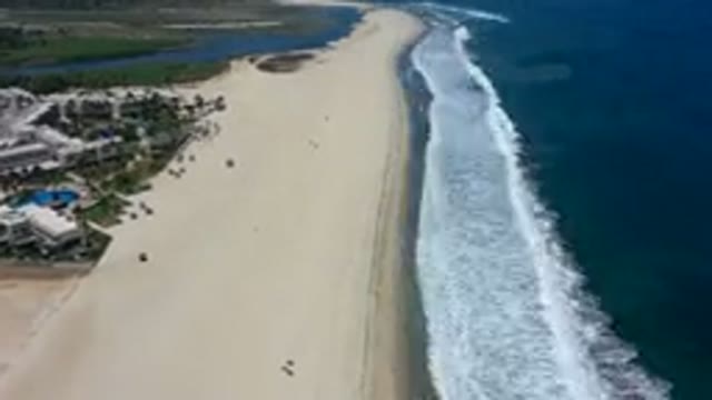 LOS CABOS MEXICO-2019: Drone Footage Over Beach As Waves Roll Into Shore Film
