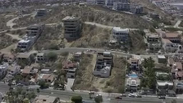 LOS CABOS MEXICO-2019: Buildings Spread Apart On A Large Field With A Street On