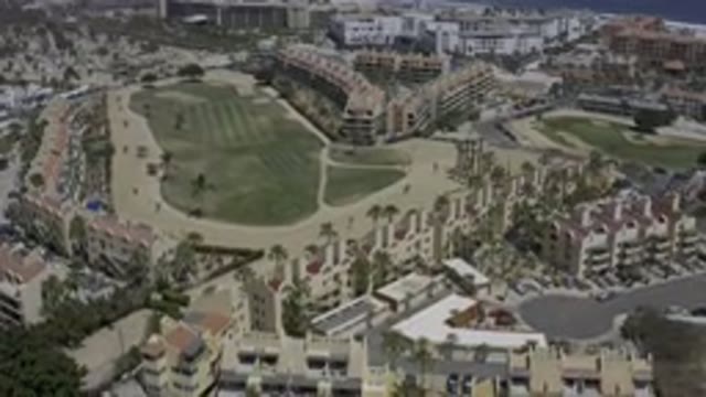 LOS CABOS MEXICO-2019: Flying View Of A Big City With A Lot Of Tree And A Park