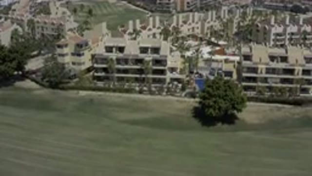 LOS CABOS MEXICO-2019: Large Green Golf Course Size Field Of Grass With A Few