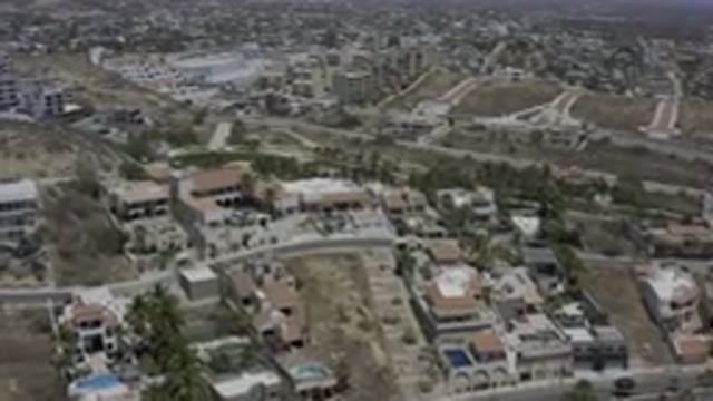 LOS CABOS MEXICO-2019: Aerial View Of A City With Hills And Large Homes