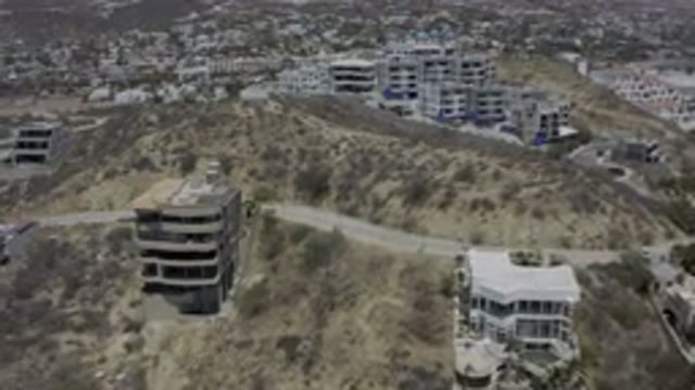 LOS CABOS MEXICO-2019: Buildings And Mountains In The Middle Of A Well Accident