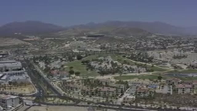 LOS CABOS MEXICO-2019: Top View Drone Footage of Ring Roads, Cars, and Buildings