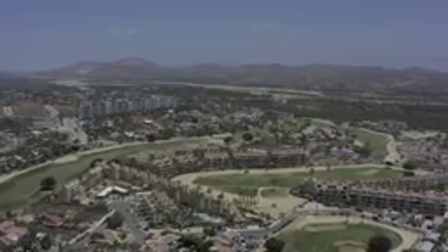 LOS CABOS MEXICO-2019: A Slow Panning View of Urban Buildings on a Hopeful Day