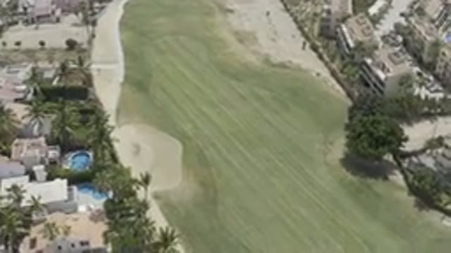 LOS CABOS MEXICO-2019: Golf Course In The Middle Of The Homes And Trees And A