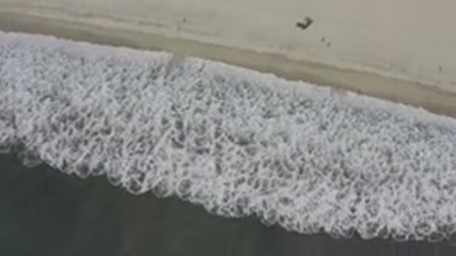 LOS CABOS MEXICO-2019: Bird's Eye View Of White Waves Breaking On Sand Beach