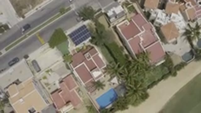 LOS CABOS MEXICO-2019: Big Buildings On Both Sides Of Busy Streets With Cars
