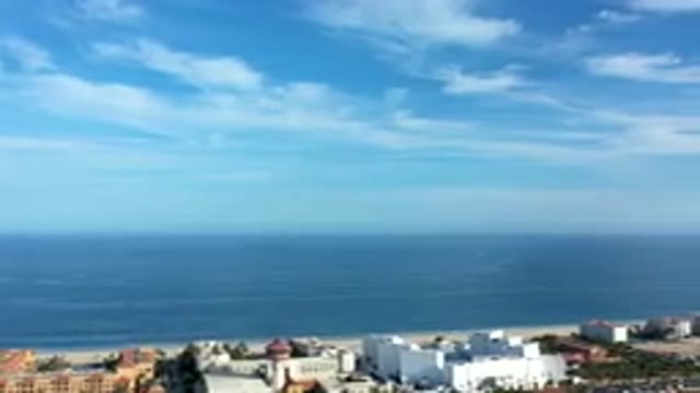 LOS CABOS MEXICO-2019: Time-Lapsed Drone Footage Of Buildings Along The Ocean