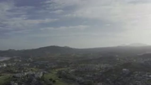 LOS CABOS MEXICO-2019: Sky Of Mountains In Spring Showing A Small Town Located