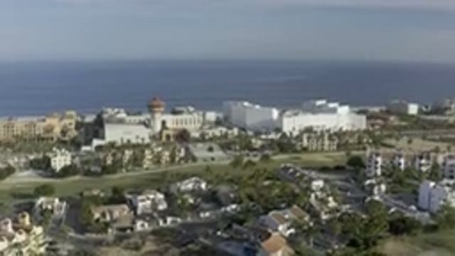 LOS CABOS MEXICO-2019: Coastal Town Houses With Trees And Open Areas With Lawns