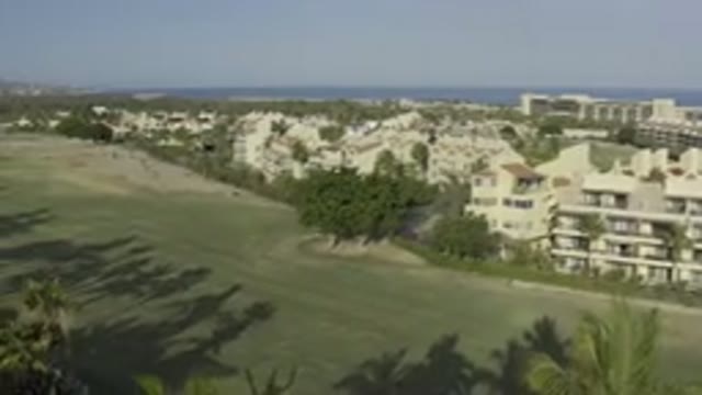 LOS CABOS MEXICO-2019: Aerial View Of A Township With Houses And Trees Around An