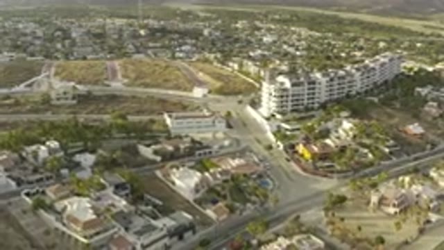 LOS CABOS MEXICO-2019: Camera Swooping Down Over Residential Land In The Broad