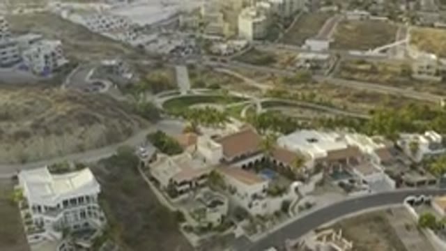 LOS CABOS MEXICO-2019: Overhead View Of Villas In Hills And White Apartment