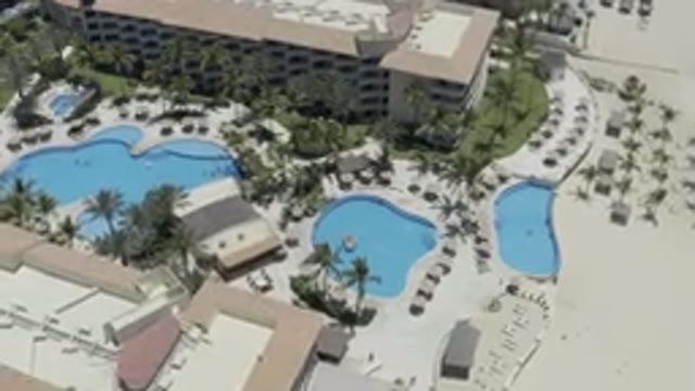 LOS CABOS MEXICO-2019: Overhead View Of Resort With Palm Tree-Lined Pools On A Sunny Day