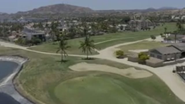LOS CABOS MEXICO-2019: Golf Course With Palm Trees And Sand In A Suburban