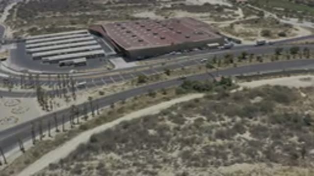 LOS CABOS MEXICO-2019: An Aerial View Of A Large Building With A Red Roof Next