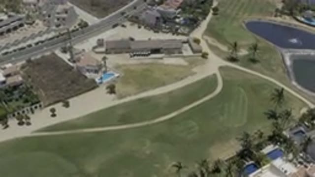 LOS CABOS MEXICO-2019: Overhead View of Golf Course with Putting Greens and Palm Trees