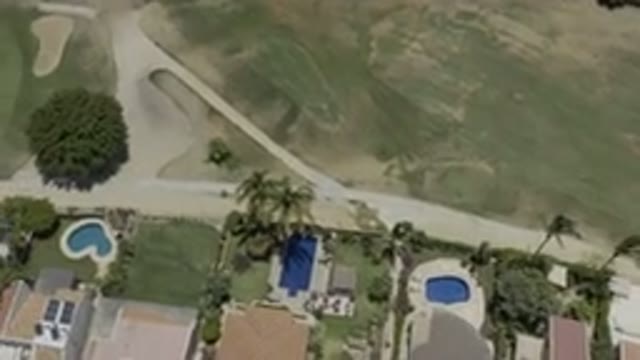LOS CABOS MEXICO-2019: Houses With Swimming Pools Set Amidst Green Lawns