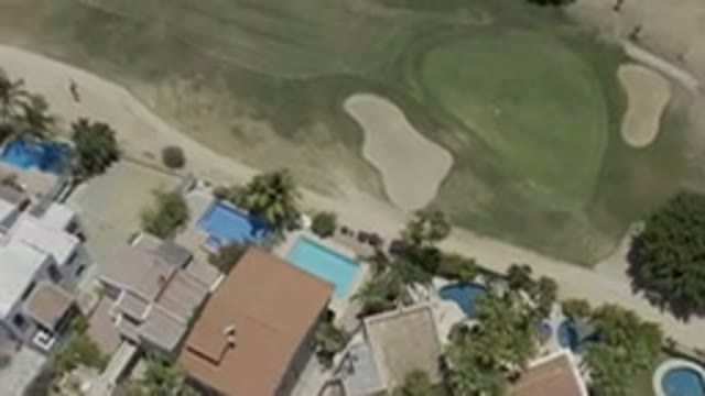 LOS CABOS MEXICO-2019: Overhead View Of Multiple Properties With Palm Trees