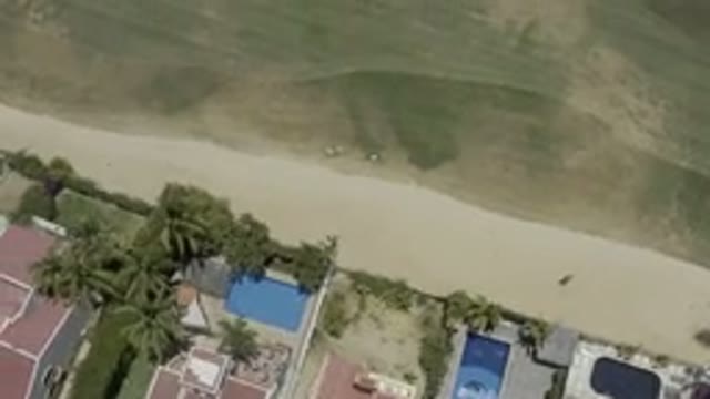 LOS CABOS MEXICO-2019: Drone Footage Over Town Buildings Swimming Pools Grassy Areas