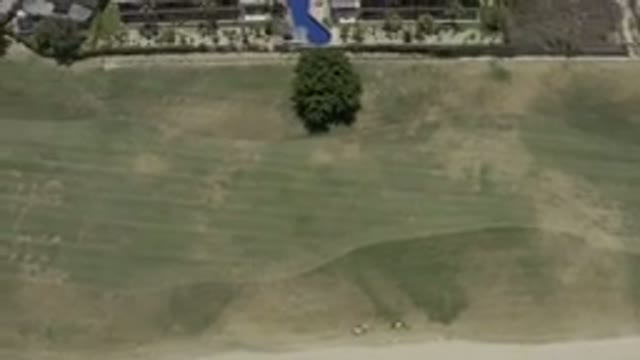 LOS CABOS MEXICO-2019: Aerial View Of A Large Open Field With Green Grass In