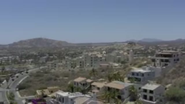 LOS CABOS MEXICO-2019: Aerial Footage Of A Large Town In A Valley With Buildings