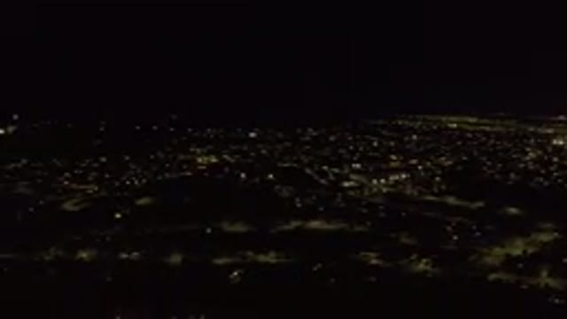 LOS CABOS MEXICO-2019: A View Of A Dark City And Its Night Lights Homes And Buildings