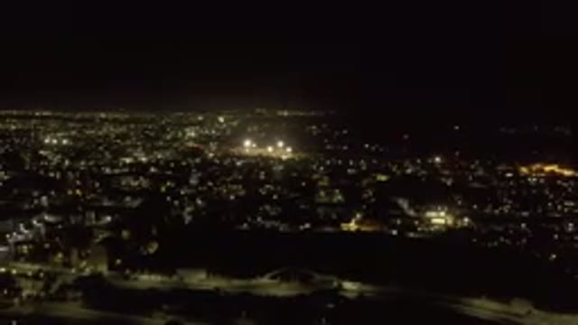 LOS CABOS MEXICO-2019: A City Taken At Night From The Air Shows Streetlights And