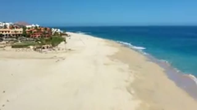 LOS CABOS MEXICO-2019: Drone Footage Over Beach Film Sped Up Showing Waves