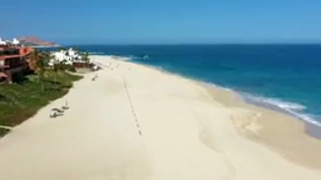 LOS CABOS MEXICO-2019: Houses Next To The Sea While The Waves Hit The Shore
