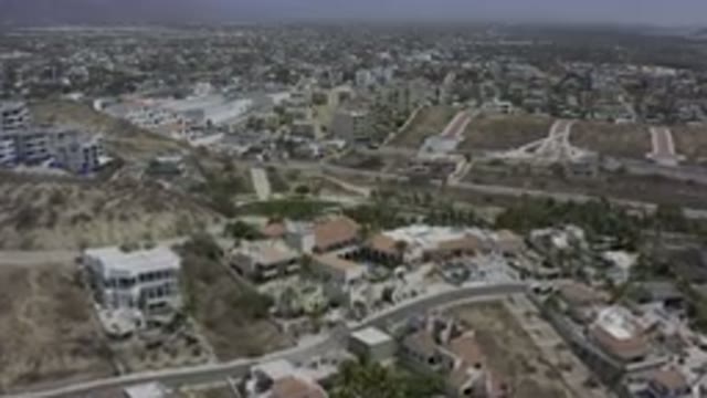 LOS CABOS MEXICO-2019: Drone Footage Of Buildings And Roads Scattered Across Hills