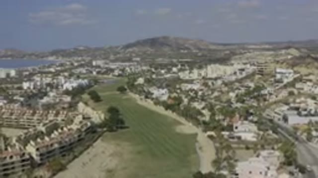 LOS CABOS MEXICO-2019: Hillside Panorama Of A City And Trees