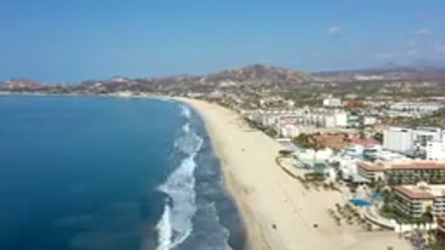 LOS CABOS MEXICO-2019: Beautiful View Of The Blue Ocean Moving Rapidly By The Beach