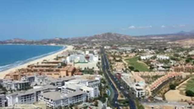 LOS CABOS MEXICO-2019: Beautiful Time Lapse of Busy Road in City Near Waterfront