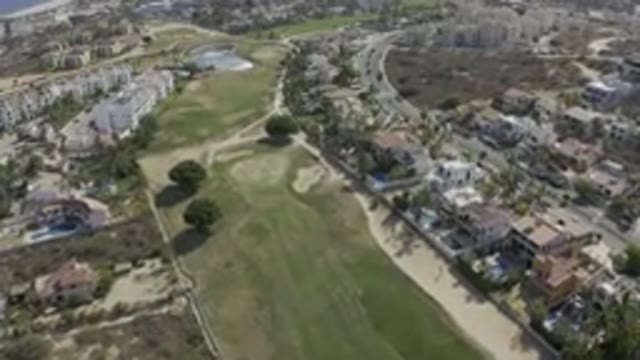 LOS CABOS MEXICO-2019: Meadows Trees Roads And Buildings Of A City During