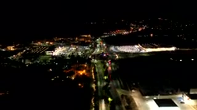 LOS CABOS MEXICO-2019: Drone Hyperlapse Of A Roundabout On A Busy Motorway At Night
