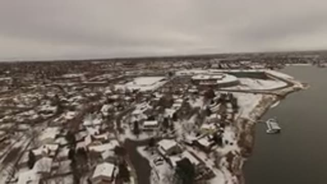 JEFFERSON COUNTY COLORADO-2015: The Snow Clad City Set Across The Lake Seems To