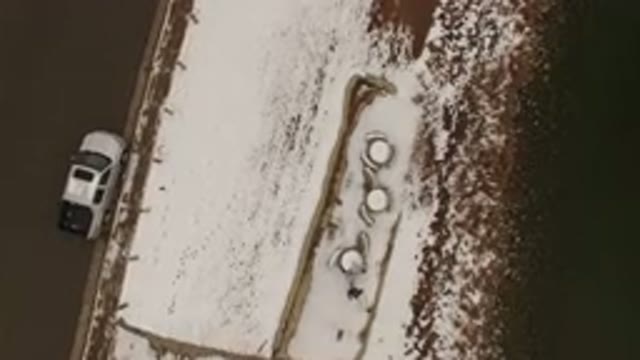 JEFFERSON COUNTY COLORADO-2015: Aerial Footage Of A Patch Of Grass Covered With Snow