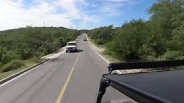 LOS CABOS MEXICO-2019: Scene of A Clean Road With Green Grass Trees Around And A