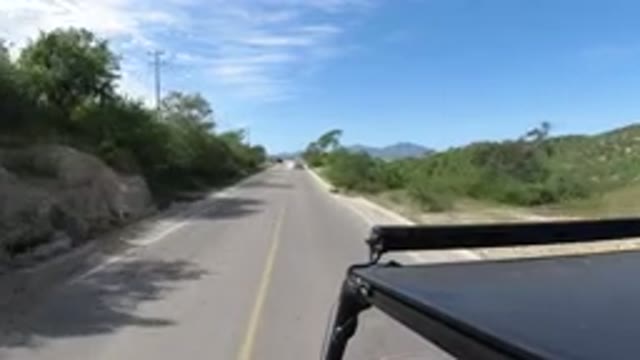 LOS CABOS MEXICO-2019: New Clean Road With Green Grass Trees Around And My