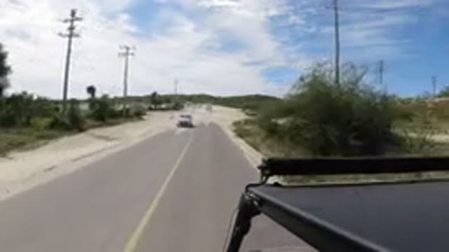 LOS CABOS MEXICO-2019: One Scene of a Clean Road With Green Grass and Trees Around