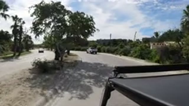 LOS CABOS MEXICO-2019: Camera Following A White Truck In Traffic On A Narrow Street